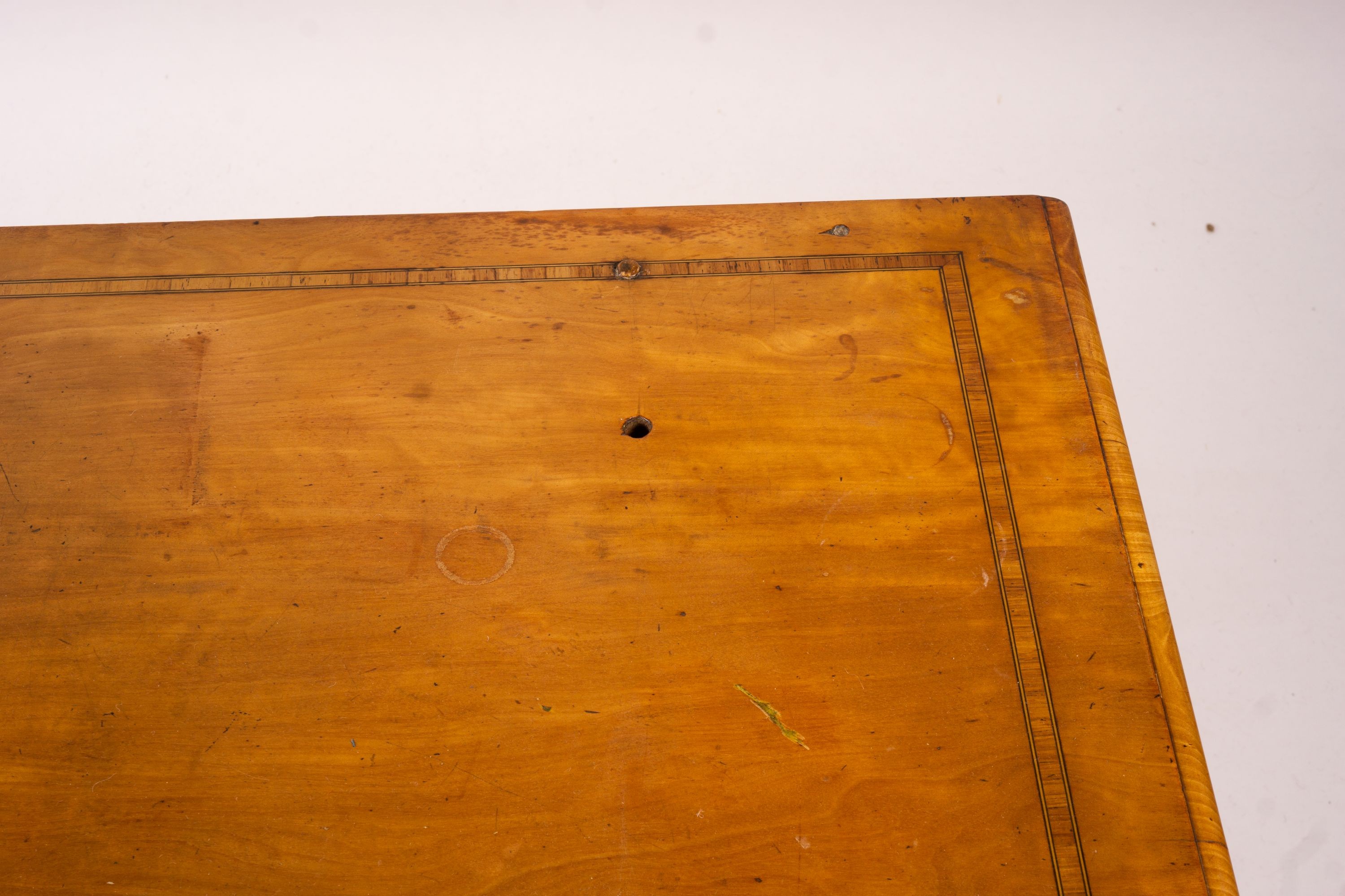 A late Victorian banded satinwood kneehole desk, width 138cm, depth 67cm, height 71cm